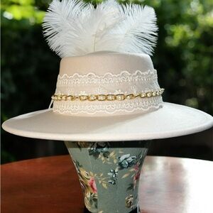 Elegant Cream & White Feathered Hat with Gold Accents